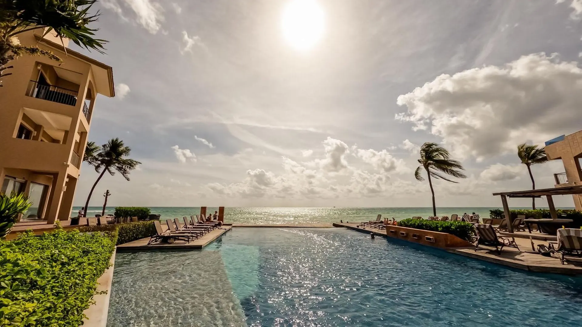 Beachfront Chic At El Faro Resort Playa del Carmen